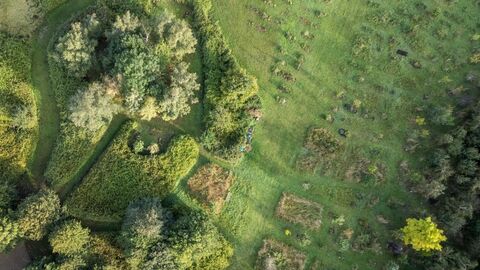 Drone image of Muchwood Burial Site on a sunny day